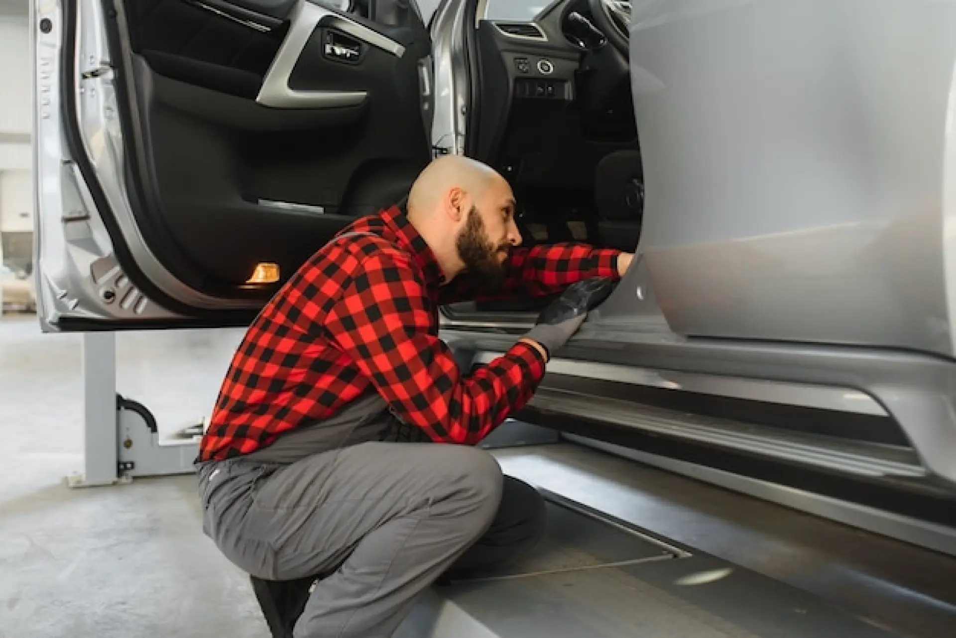 car door panel being repaired