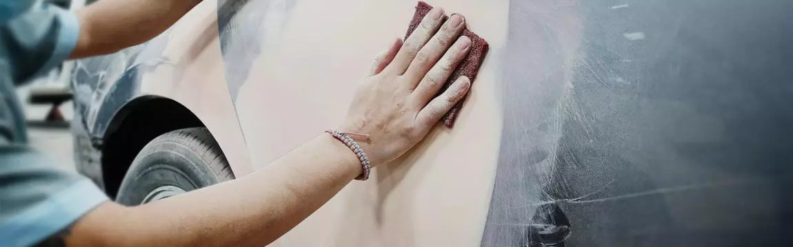 How do body shops repair dents